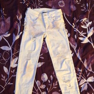 ripped, white-pink tint, American Eagle jeans.